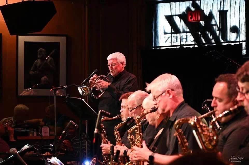 JoySwing musicians performing on stage at a jazz club