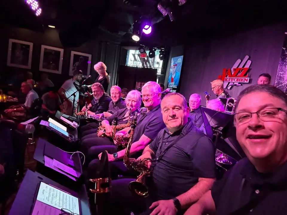 JoySwing saxophone section beside the bandstand